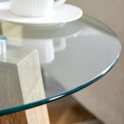 Modern And Practical Round Table. Made Of Clear Tempered Glass Top And Wood-coloured MDF Material. Suitable For Living Rooms And Bedrooms